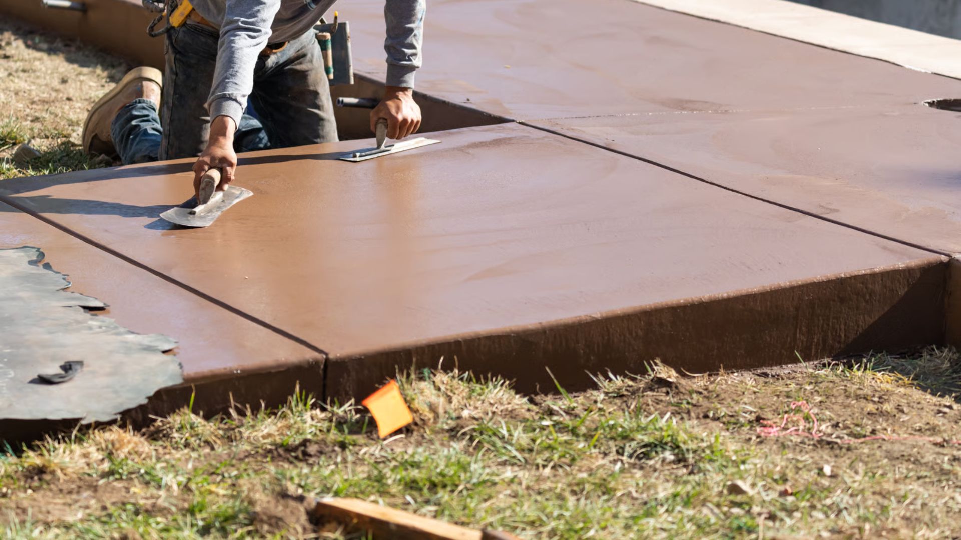 Concreter working on footpath concreting